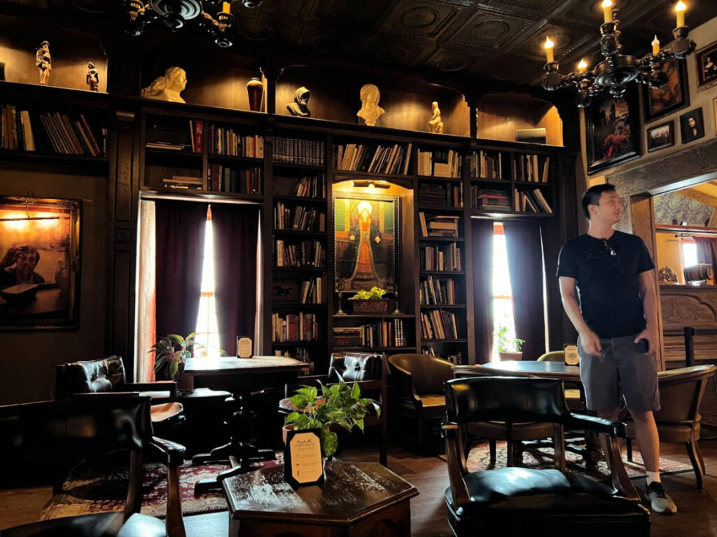 The author's husband admiring the interior of Paschall Bar