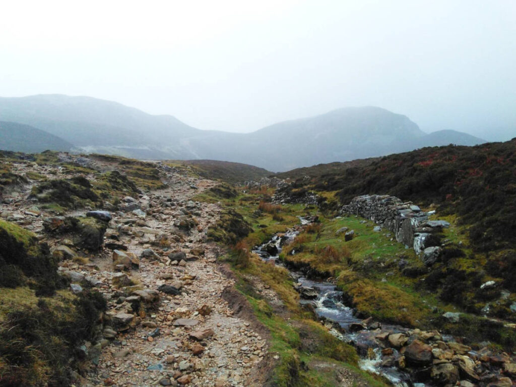 View of the path ascending Croagh Patrick on a foggy day