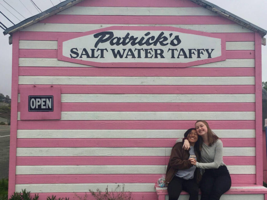 Author's friends posing in front of the old-timey candy store