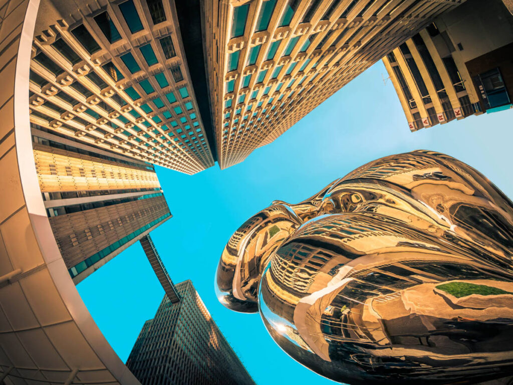 View of the John Portman’s “Belle” sculpture and the surrounding buildings seen from below