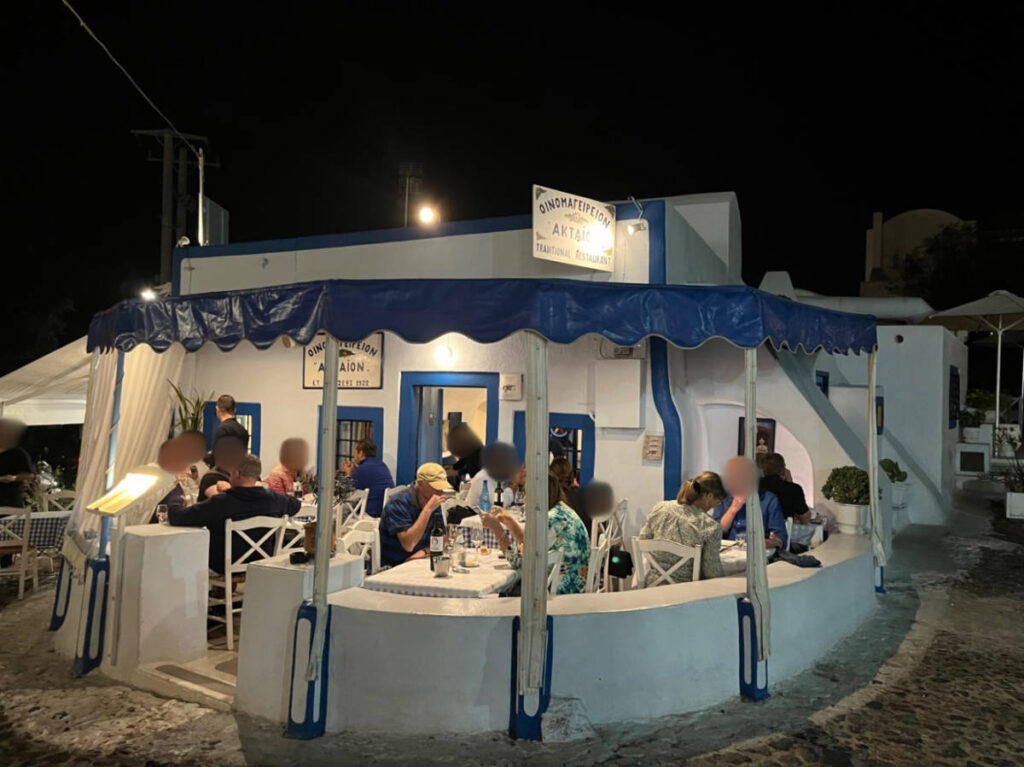 People dining at the outdoor dining area of Aktaion Restaurant