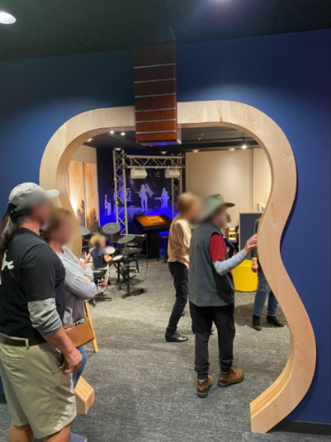 People exploring inside the Museum of Making Music