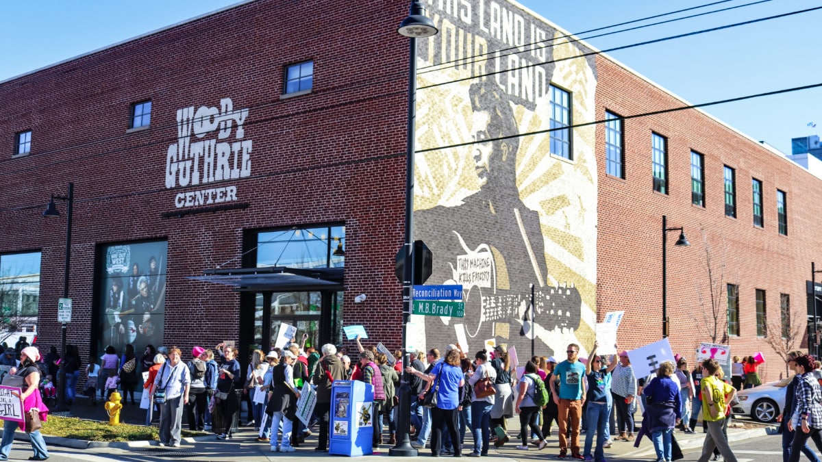 View of the crowd outside the Woody Guthrie Center