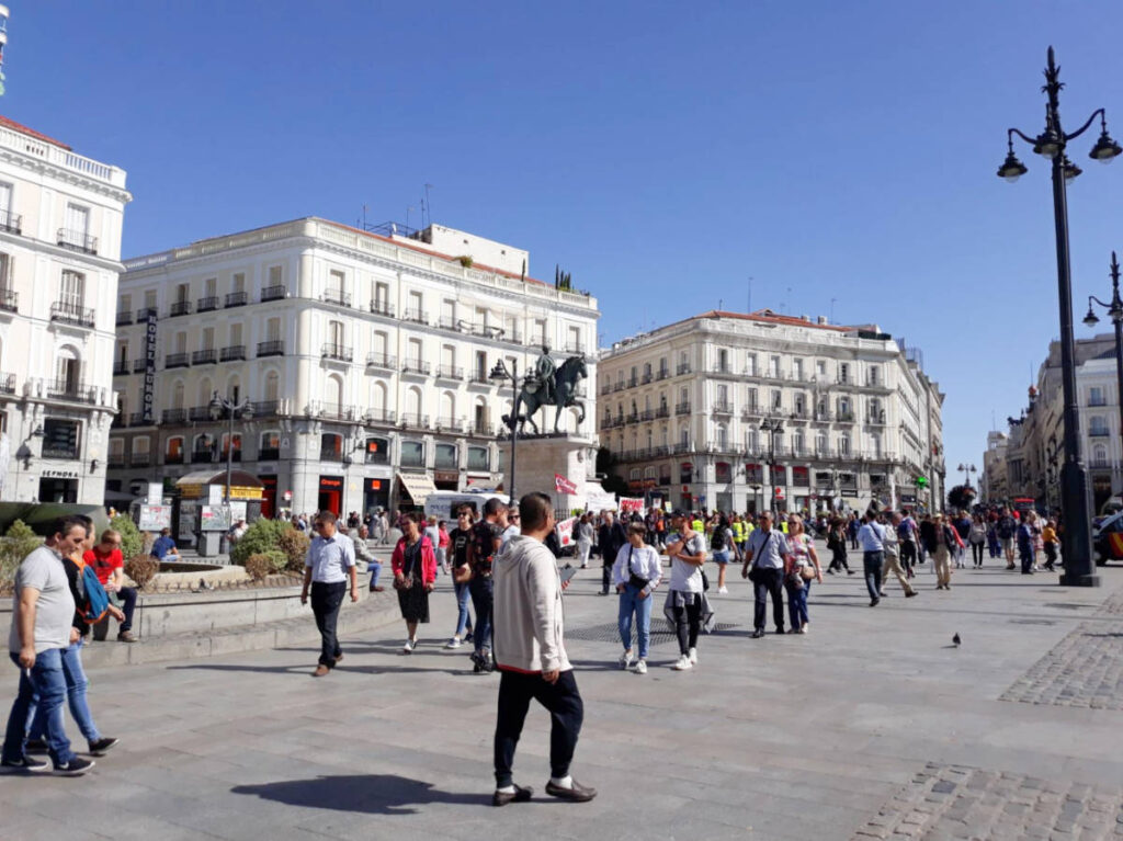Clear blue sky over the people in Madrid