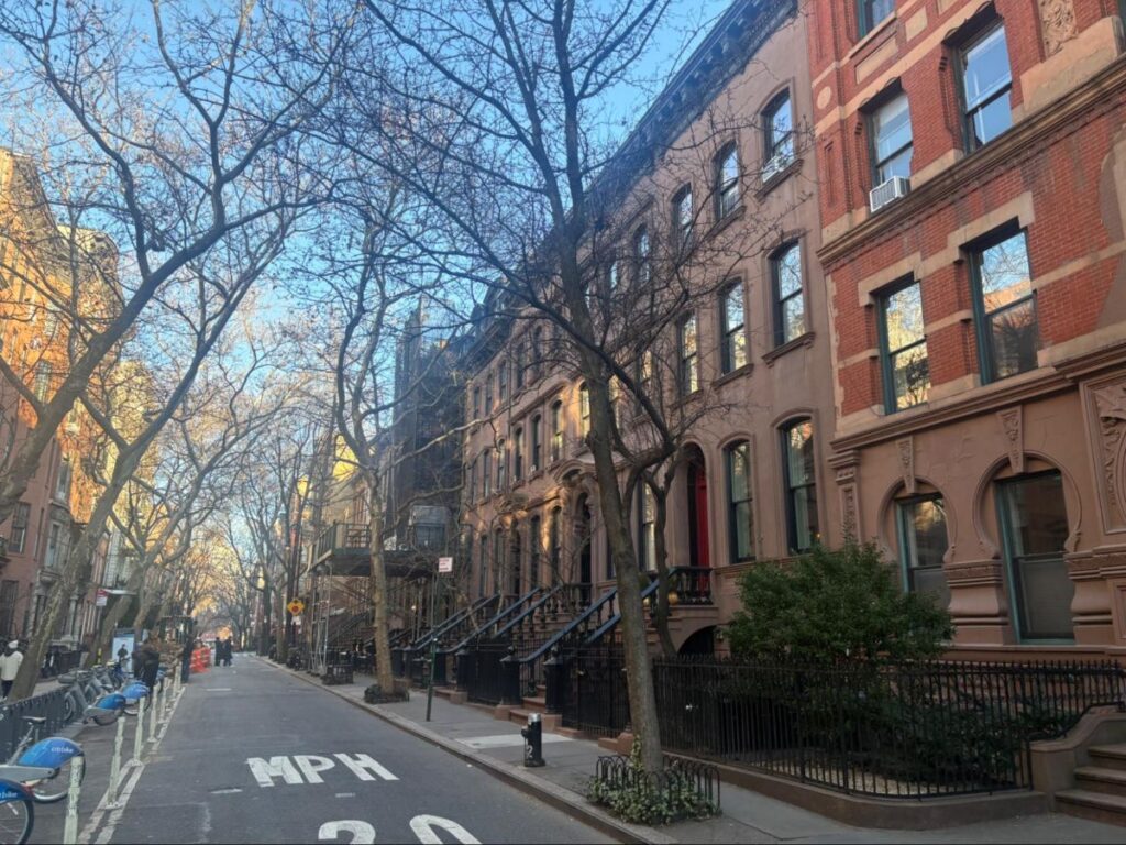 The Tree-lined brownstones on Perry Street