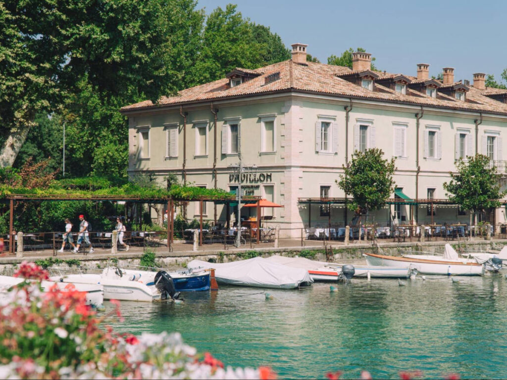View of boats at the canal of Peschiera del Garda