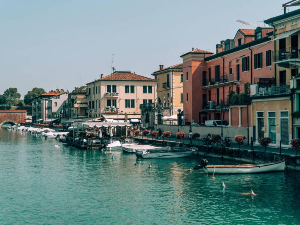 View of the docked boats and architecture at the Peschiera del Garda’s Harbors