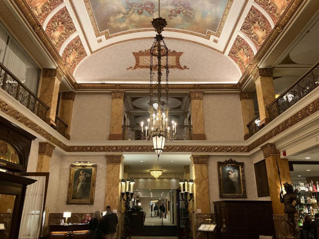 View of the roofing and chandelier at the Pfister Hotel lobby