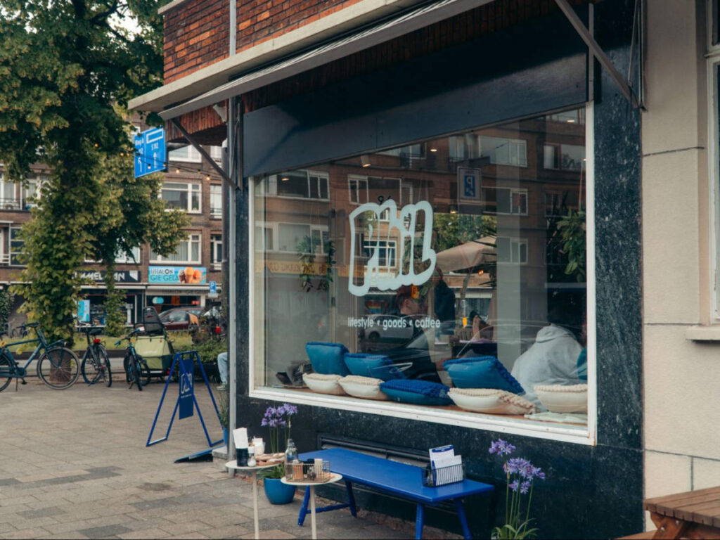 View of the huge window of Phil coffee shop from the outside