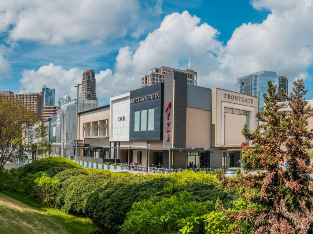 View of the luxury storefronts at Phipps Plaza surrounded by greeneries