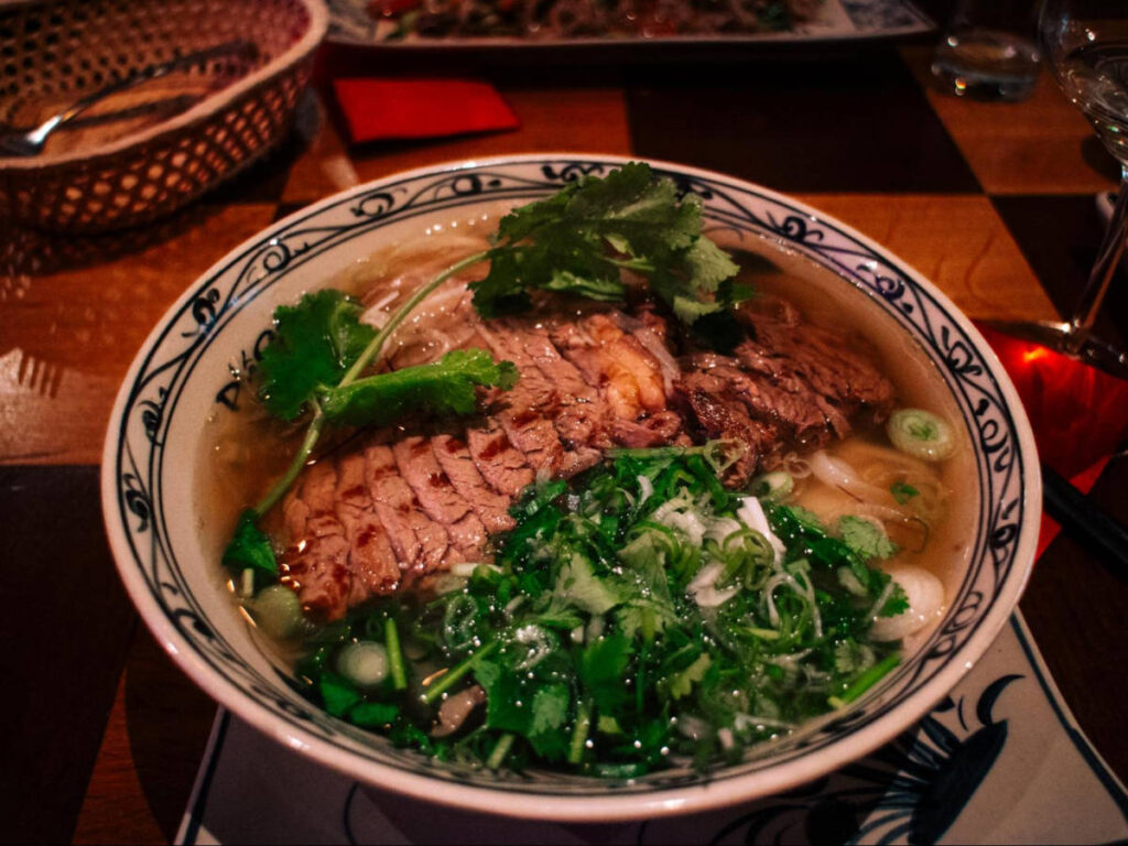 Closeup look of a big bowl of pho at Pho Co Restaurant