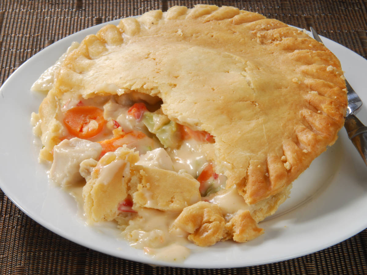 A chicken pot pie on a plate in Teddy Bear Restaurant