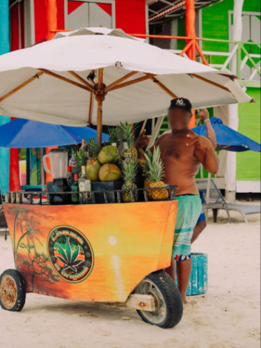 The salesman with his pineapple juice cart