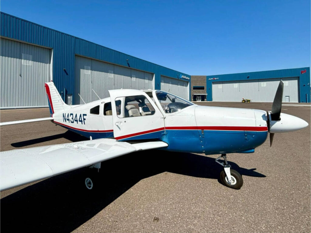 Clear blue sky over the Piper Cherokee