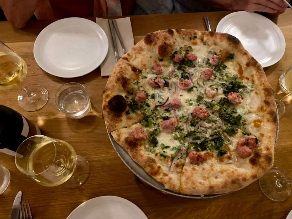 View of the pizza and wine at Flour + Water