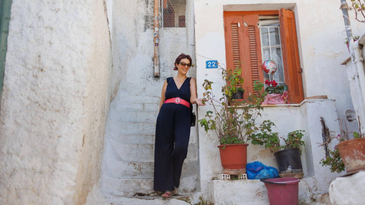 The author, Rebecca Hall posing for a photo at the Plaka and Anafiotika neighbourhood