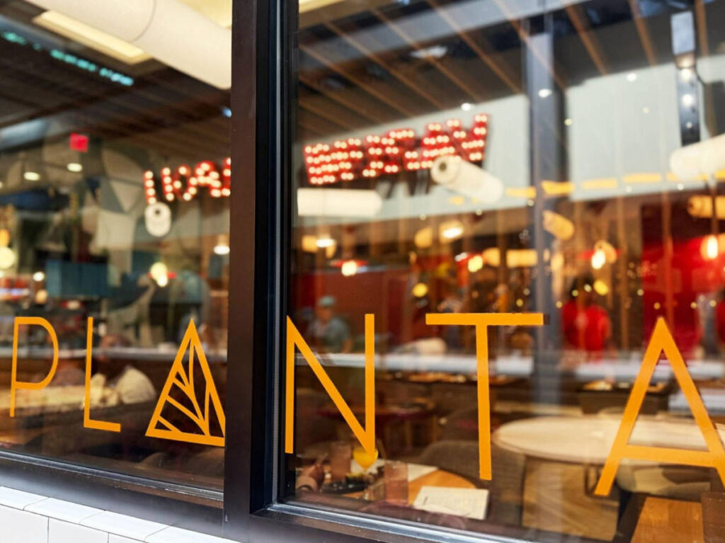 Planta sign on the window at Krog Street Market