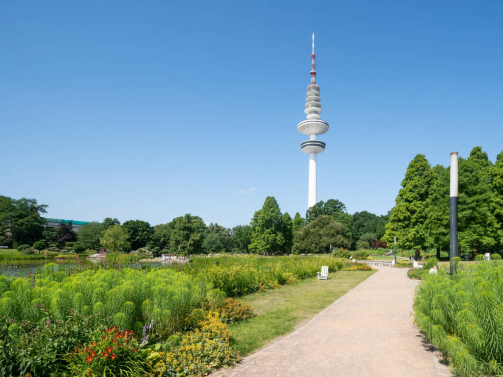 View of the Hamburg TV Tower and the greenery at the Planten un Blomen park