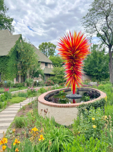 View of the lush greenery around the fountain in Denver Botanic Gardens