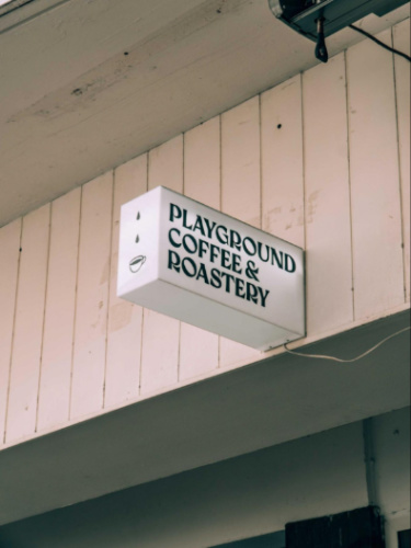 The signage of Playground Coffee & Roastery