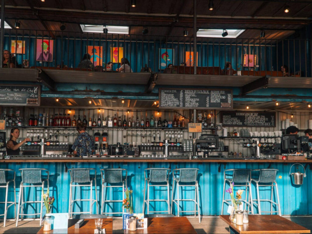 View of the bottle wall in the bar area of Pllek