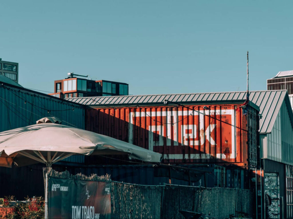 View of the signage of Pllek in the old hangar