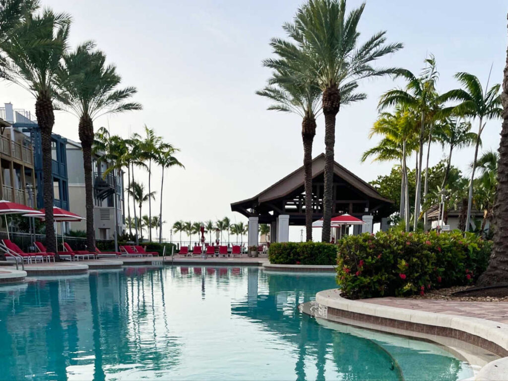 View of the vibrant lounge seats around the pool area at Marlin Bay Resort & Marina