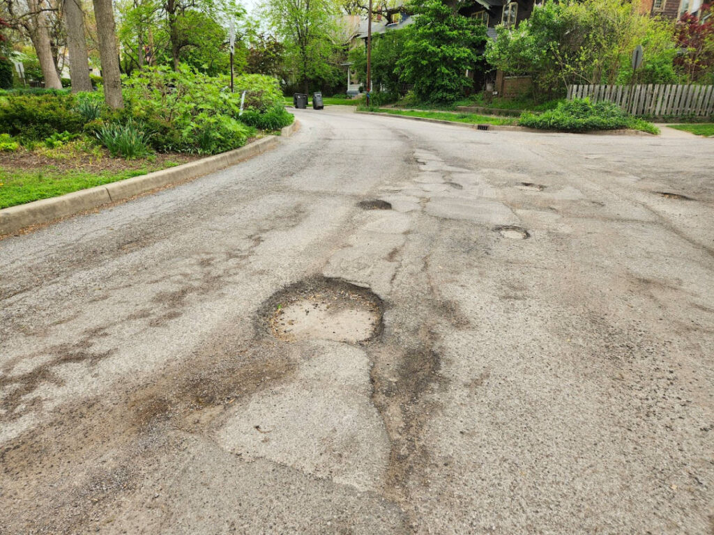 A pothole on a street in Indy
