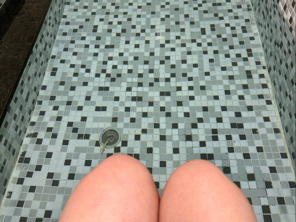 The author relaxing her feet in a private hot spring bath