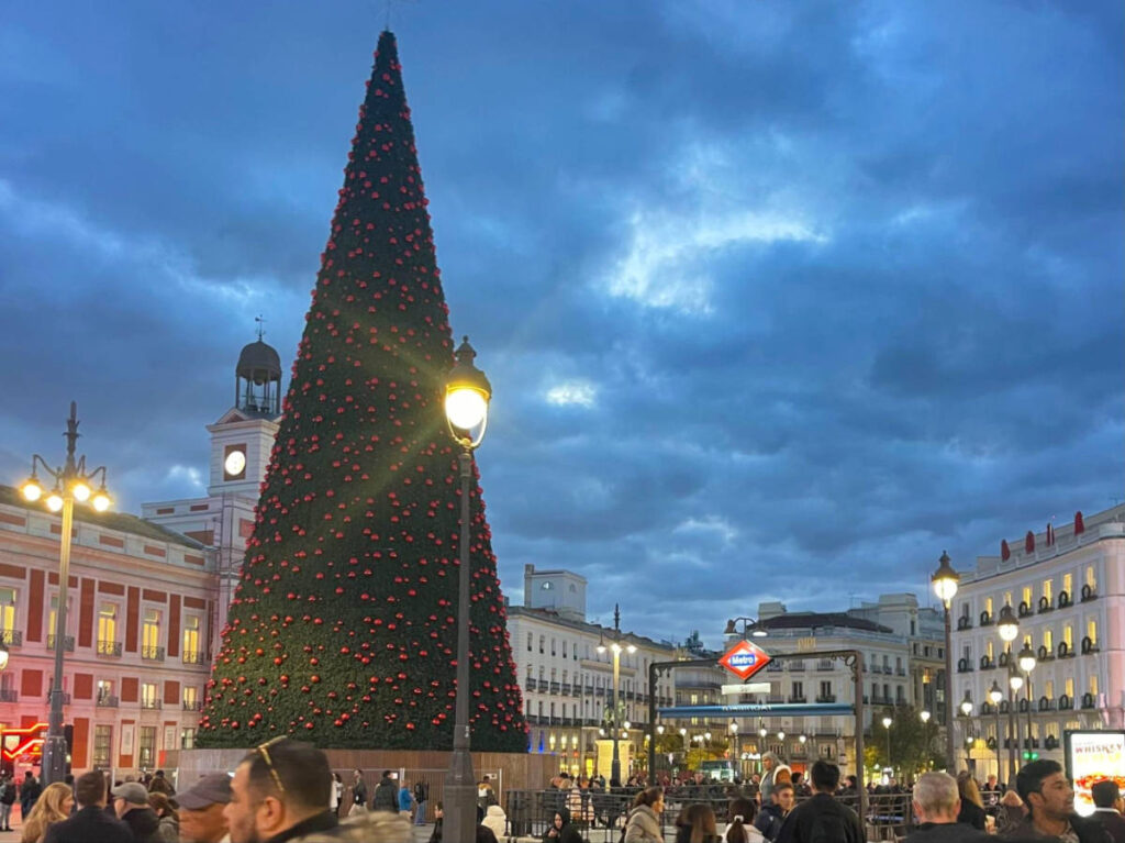 A huge holiday tree in Puerta de Sol at night