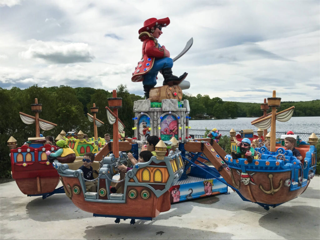 The children on the colorful ship-like ride at Quassy Amusement and Water Park