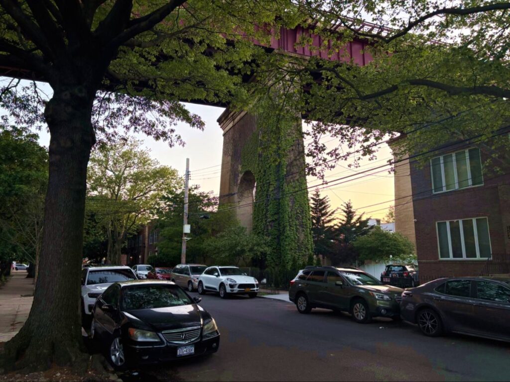 View of the Train line crossing Queens residential streets