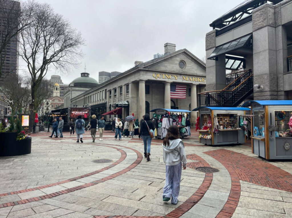 View of the bustling Quincy Market at Faneuil Hall Marketplace