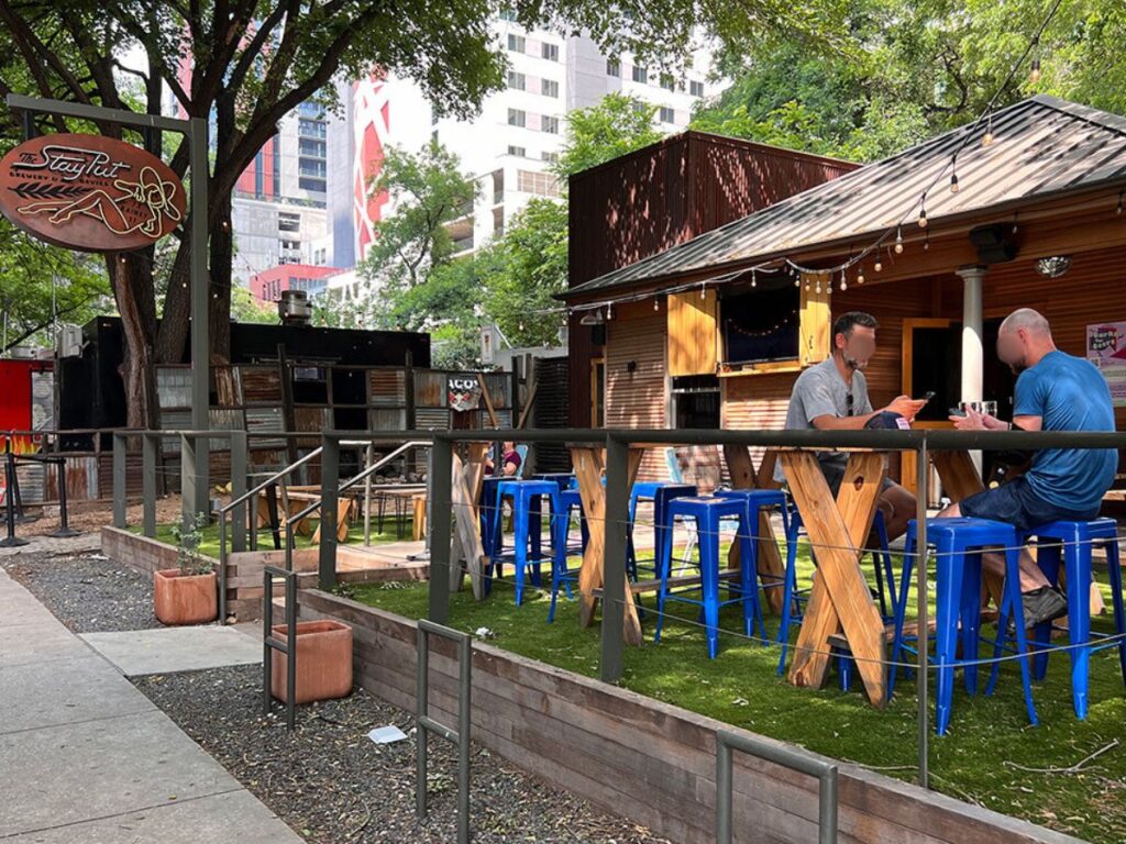 Two people dining al fresco at Stayput