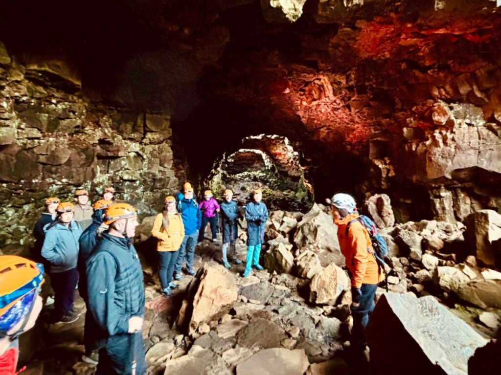 A group of people listening to the safety precautions at Raufarhólshellir Lava Tunnels
