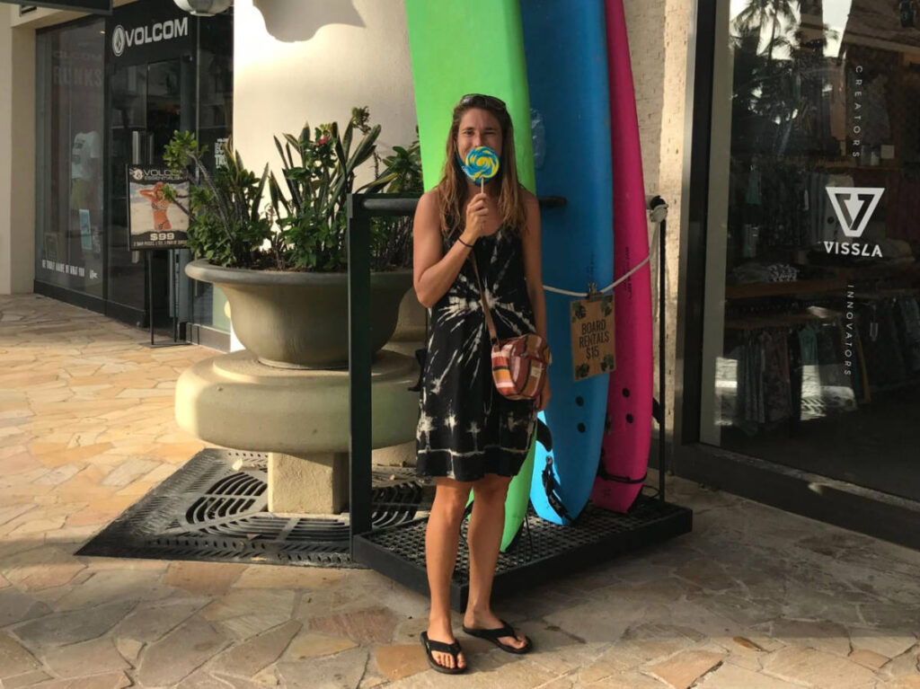 The author Rebecca Parsons holding a huge lollipop