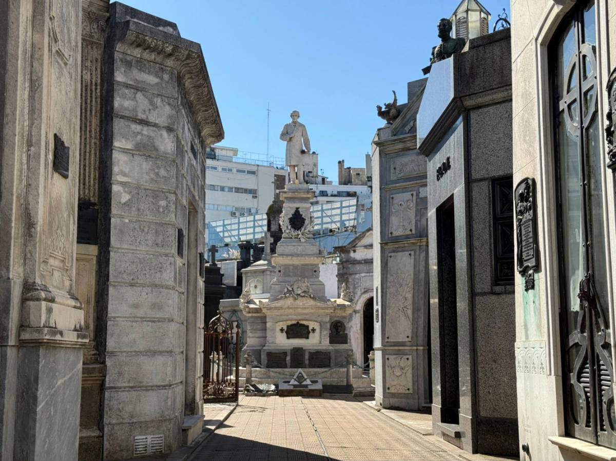 View of the Mausoleums around and the statue in Recoleta Cemetery