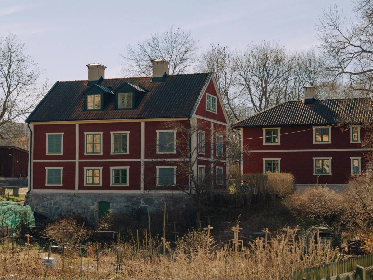 View of the red wooden homes of Långholmen