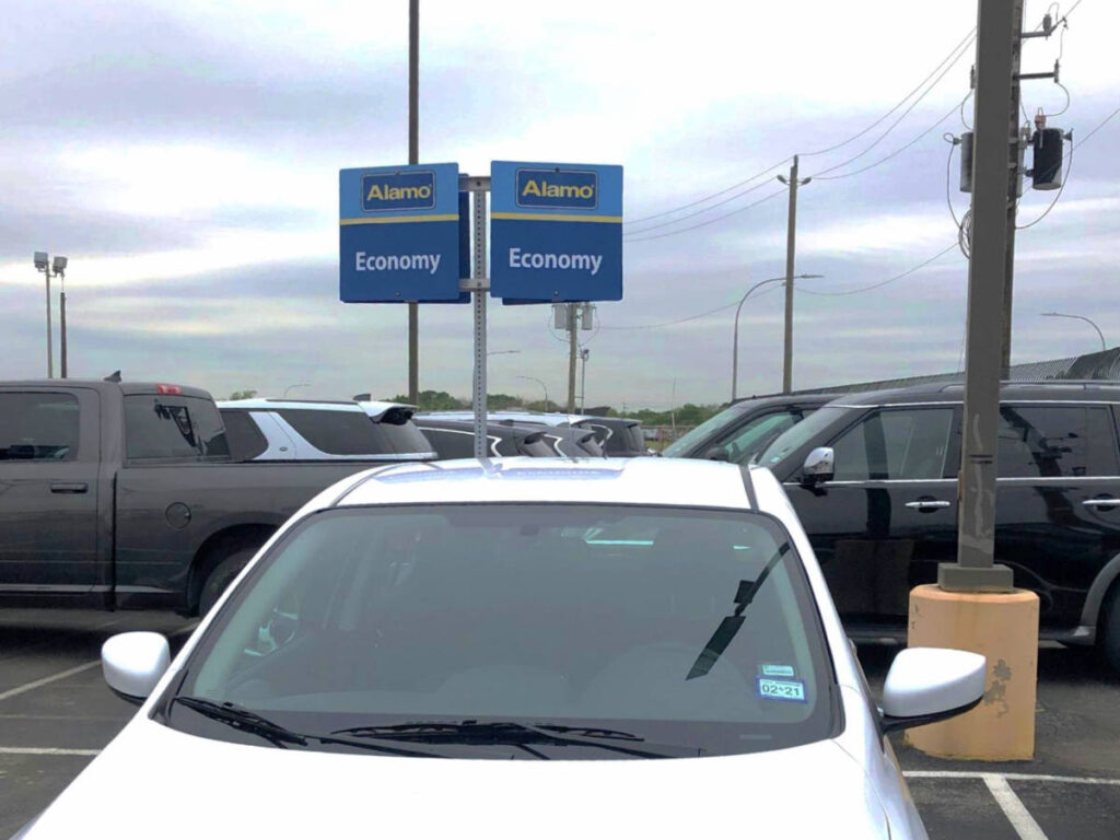 Car rentals parked on a parking