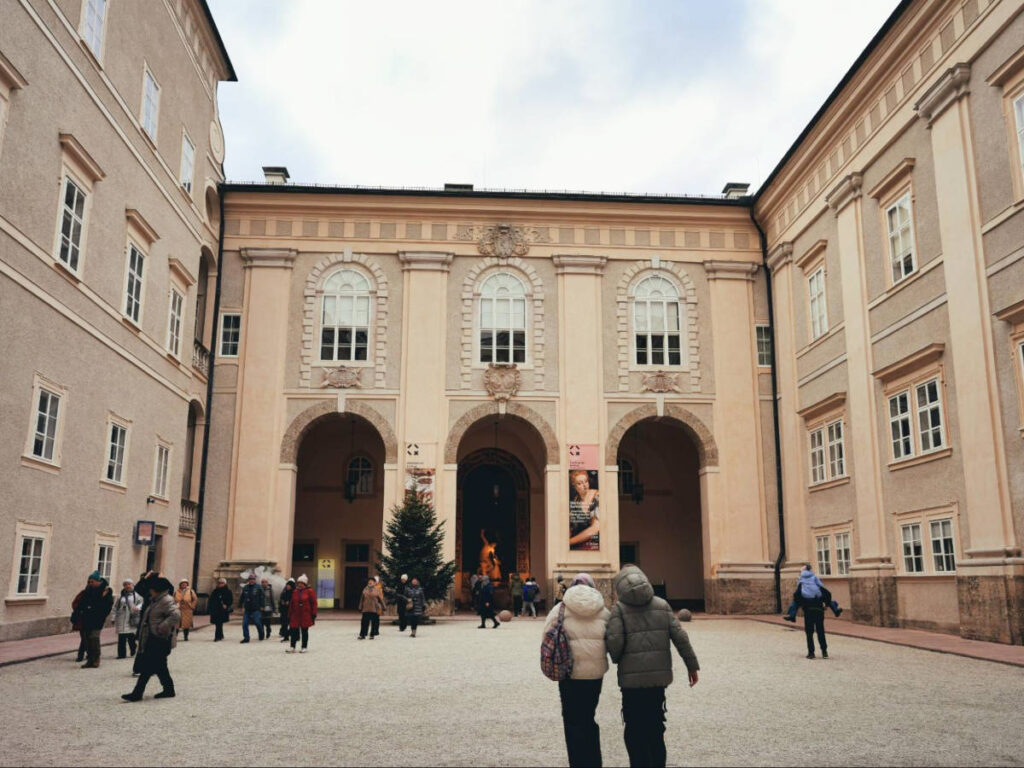 People wandering around the inner court at the Residenz Palace