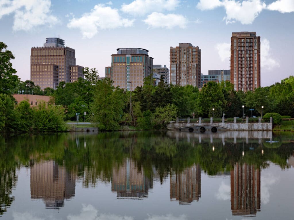 Buildings on Reston Town Center reflected on the lake