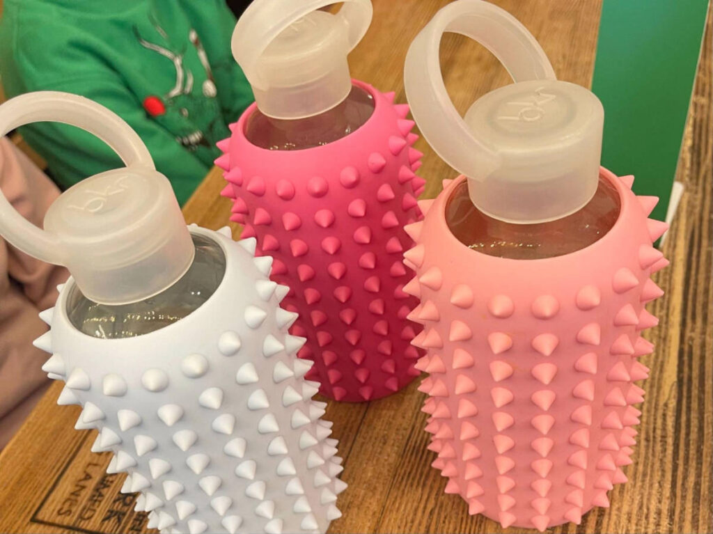 View of reusable glass water bottles