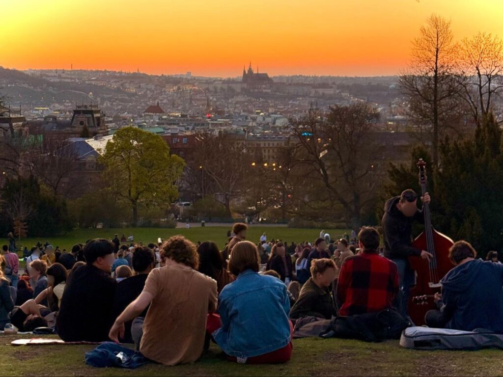 Groups gathered at Riegrovy Sady hills to watch the sunset