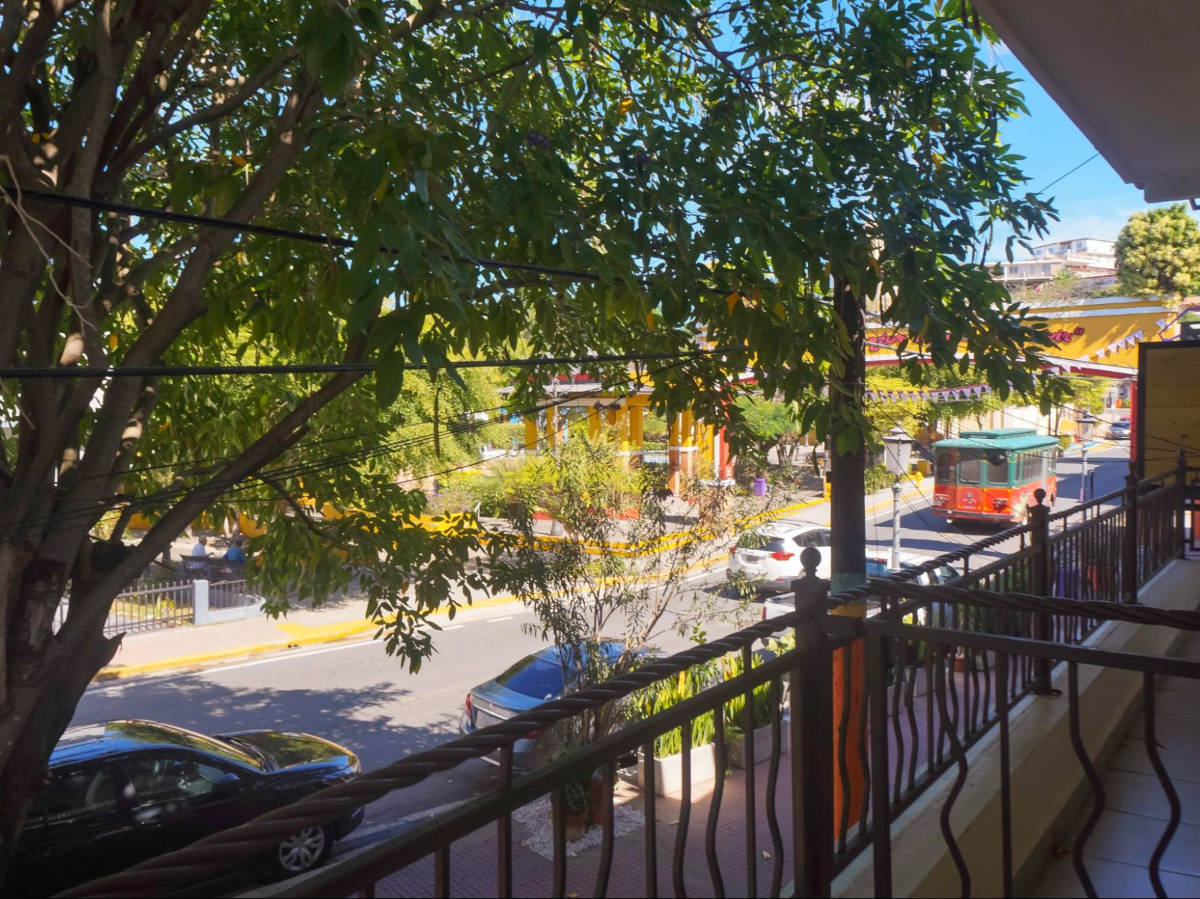The overlooking view of the street from the balcony