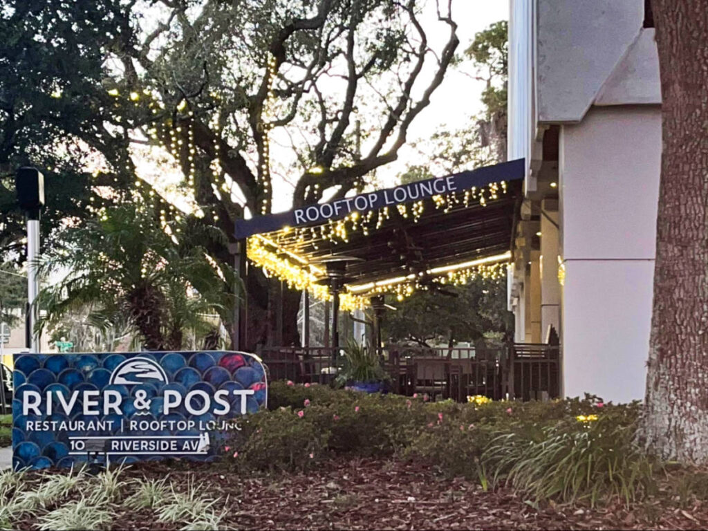 View of the signage of River and Post outside