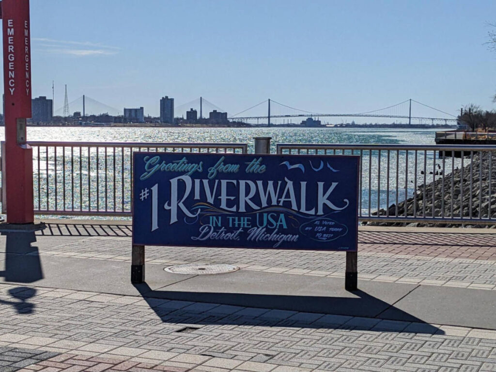 The signage in the Riverwalk overlooking the Detroit River