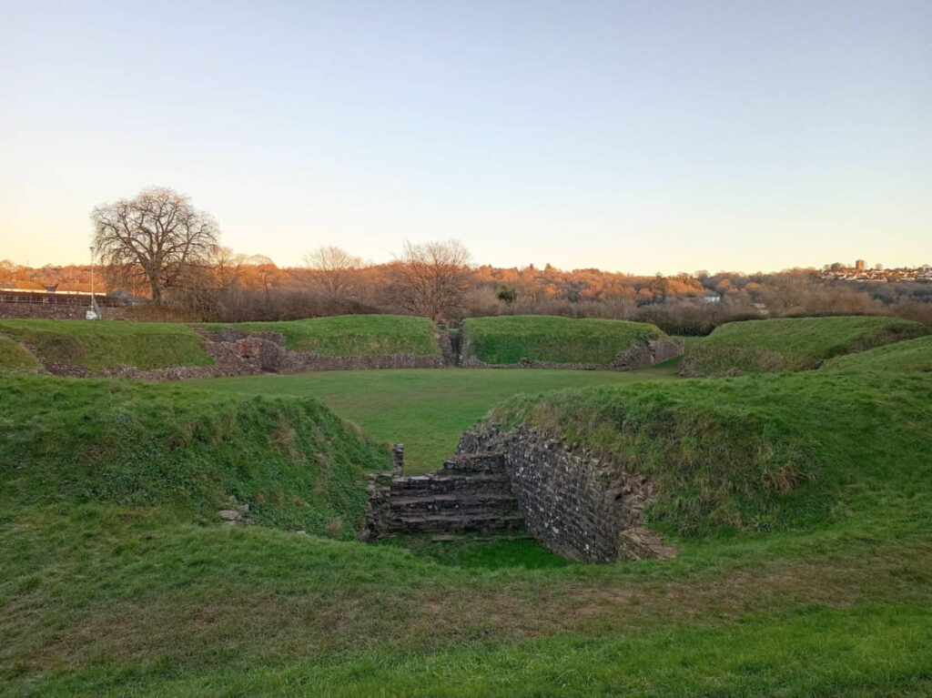 Panoramic view of the lush landscape around the Roman Amphitheatre in Britain