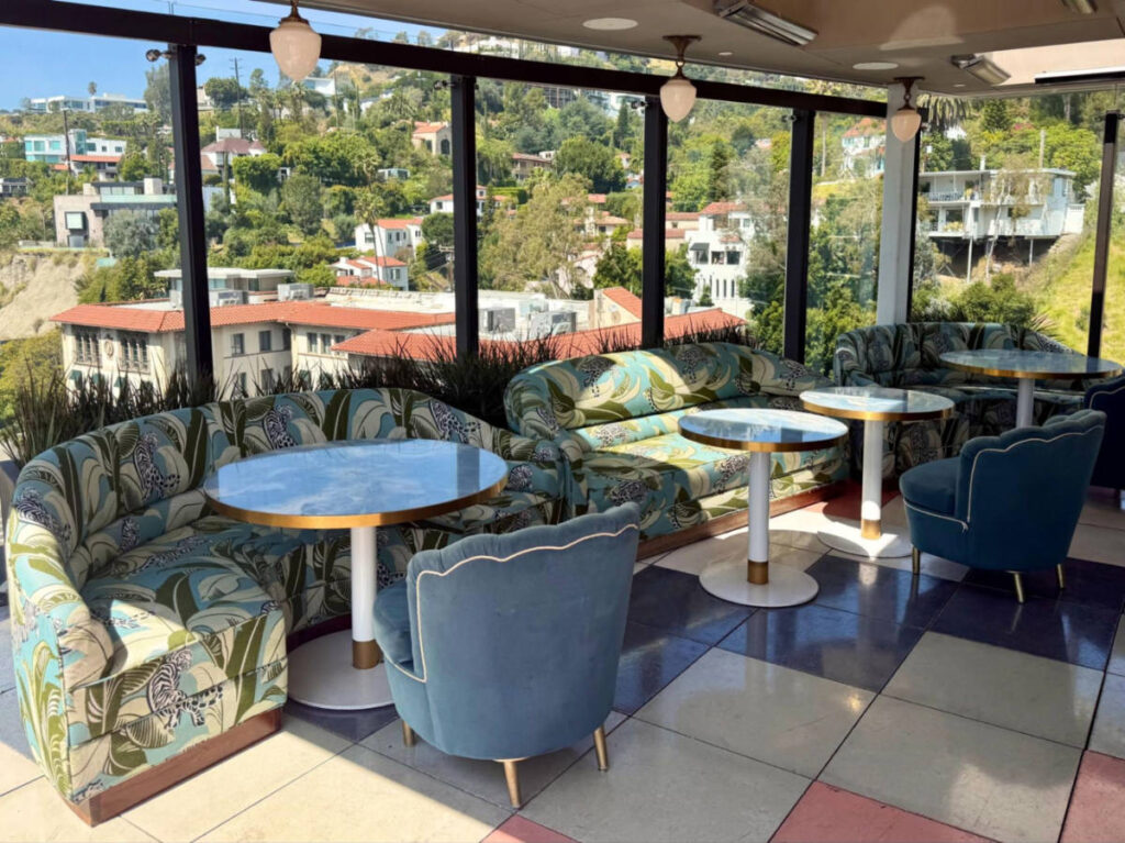 The rooftop seating area with overlooking views of the Hollywood Hills