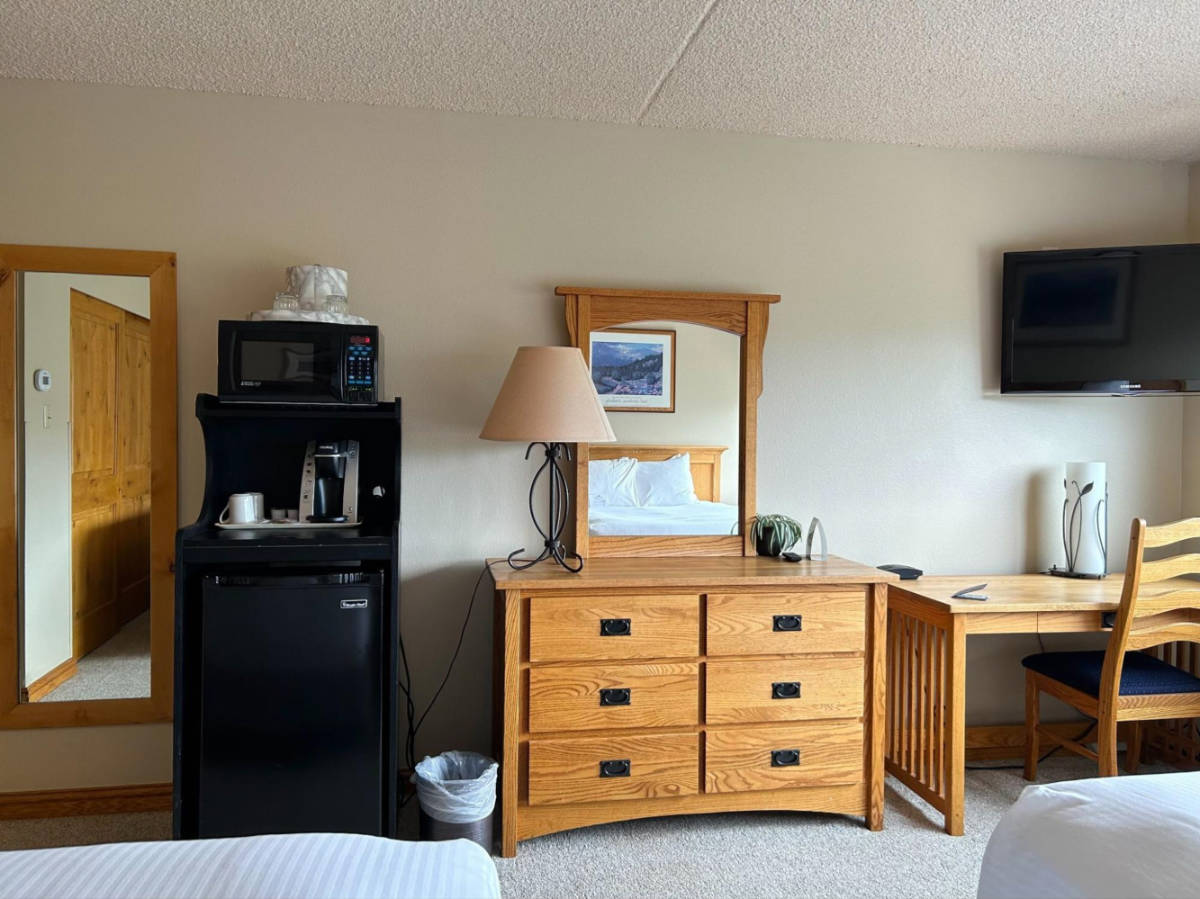 View of the interior of the room with a fridge and work desk in Breckenridge Ski Resort