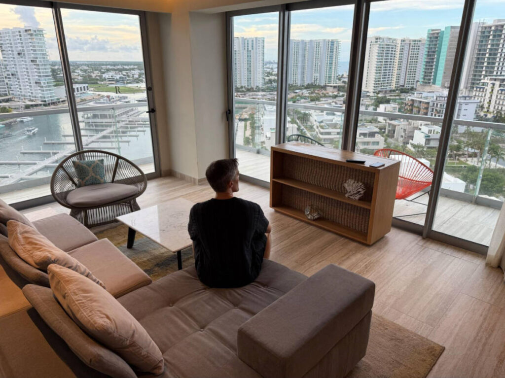 Travel Lemming founder Nate Hake, enjoying the view of the marina in his room at the Renaissance Cancun Resort & Marina